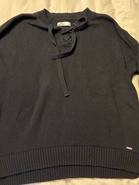 Hollister Black women's sweater a lace-up neck detail, relaxed fit. Size Medium.